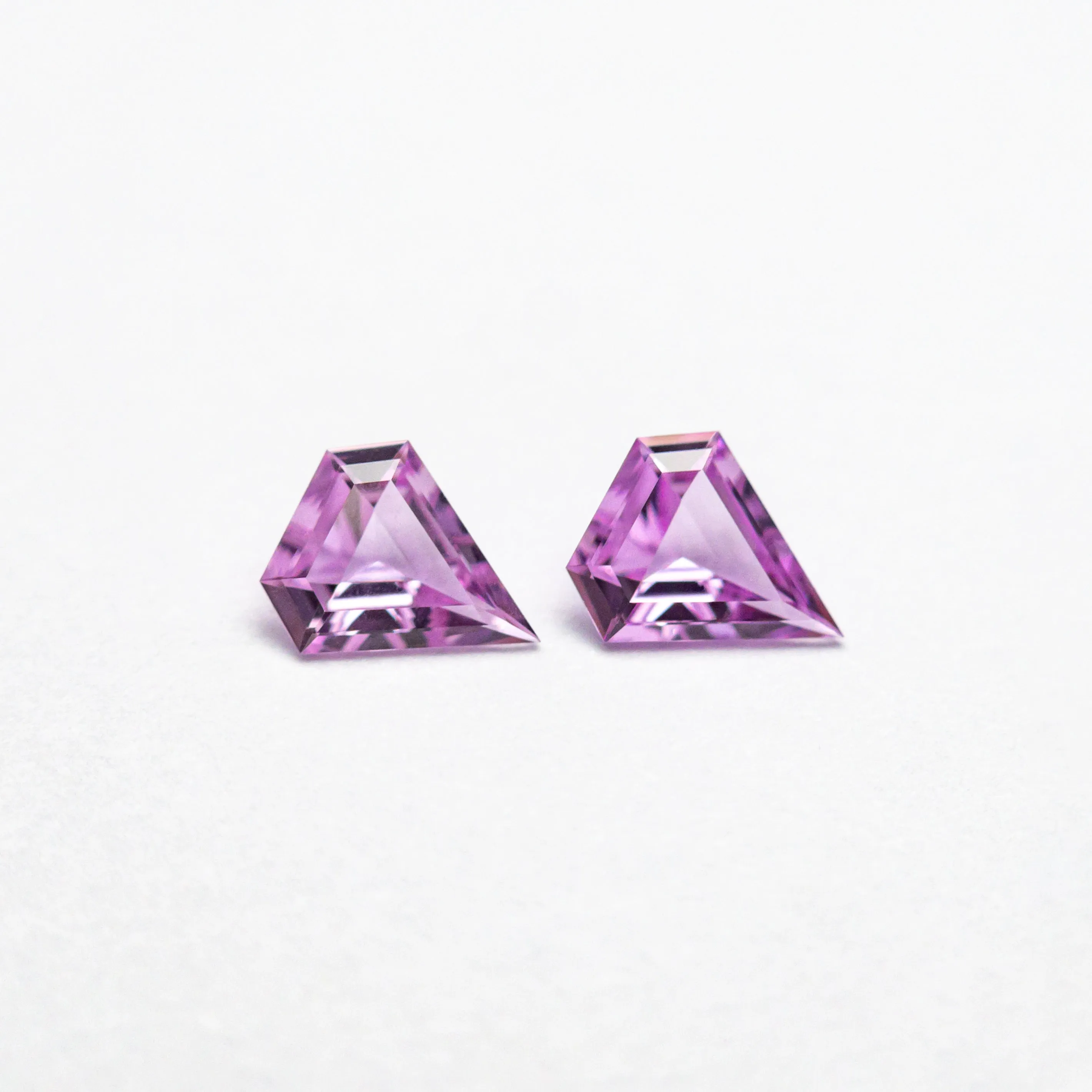 0.23cttw 2pc 4.03x3.46x1.39mm 4.01x3.45x1.38mm Shield Step Cut Sapphire Matching Pair 22769-01