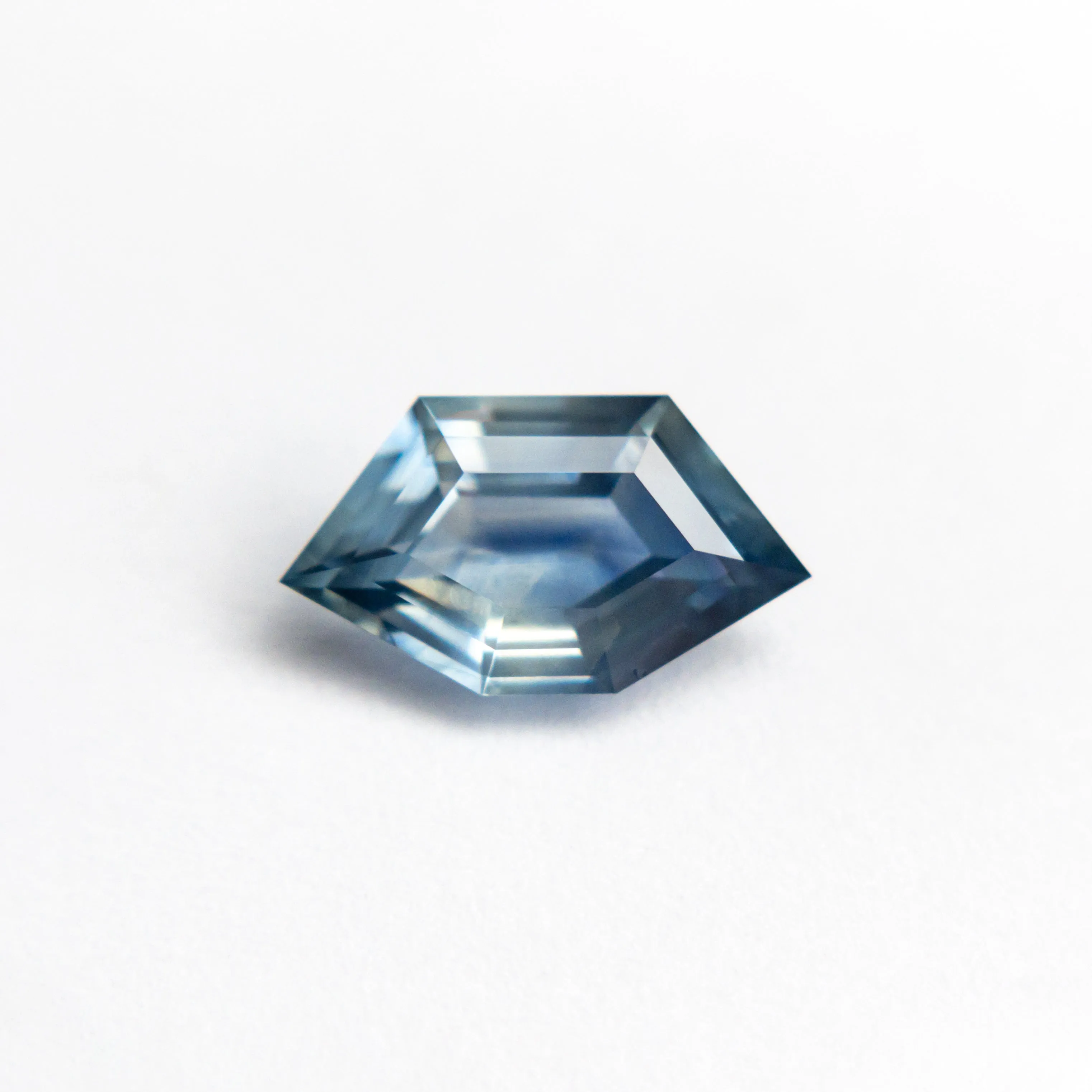 1.05ct 9.07x5.08x2.99mm Shield Step Cut Sapphire 20838-01